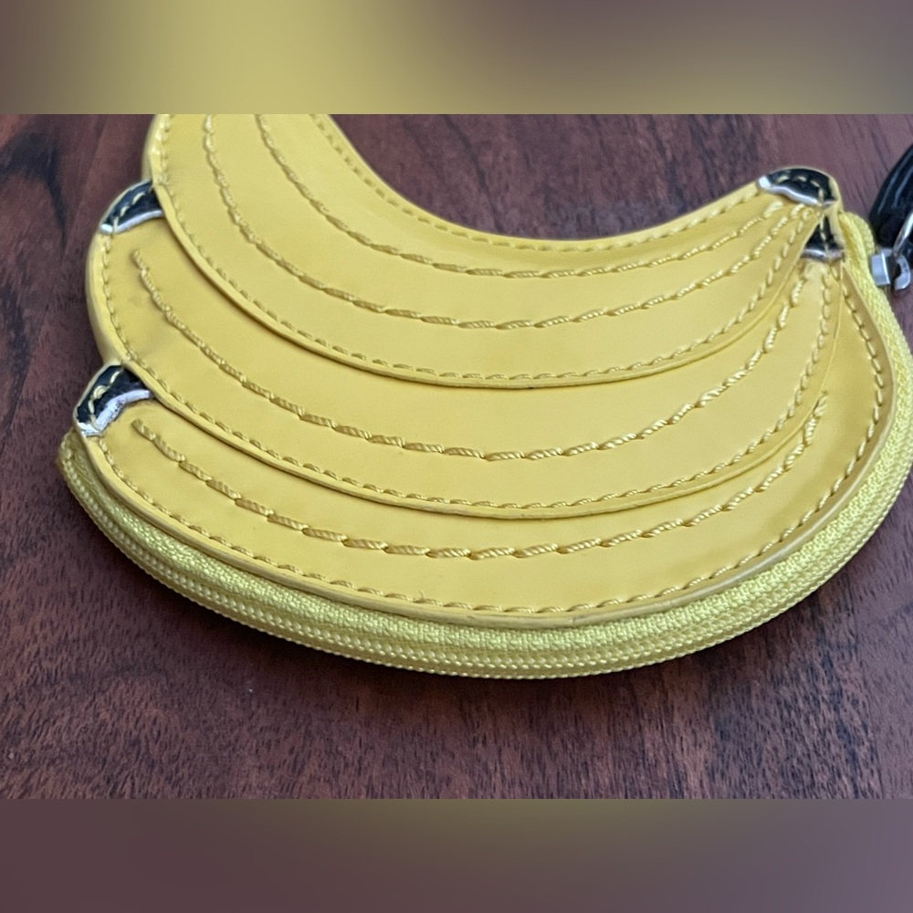 COACH Banana Coin Purse - NWT
- CALLOUTS - Picture 4 of 8